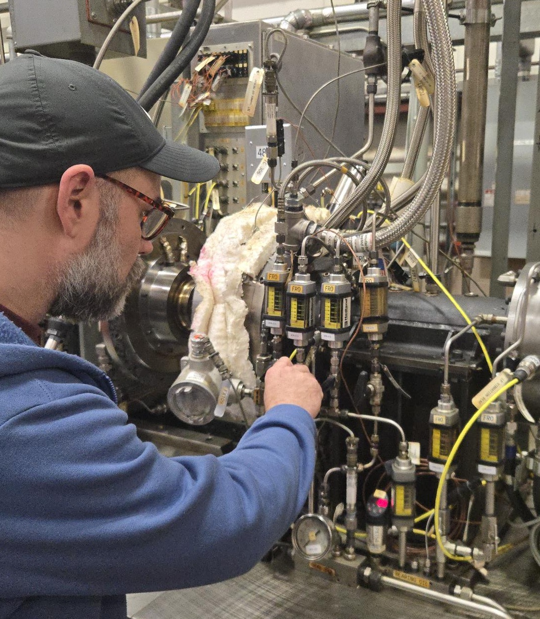 Lab Technician and Rig Photo